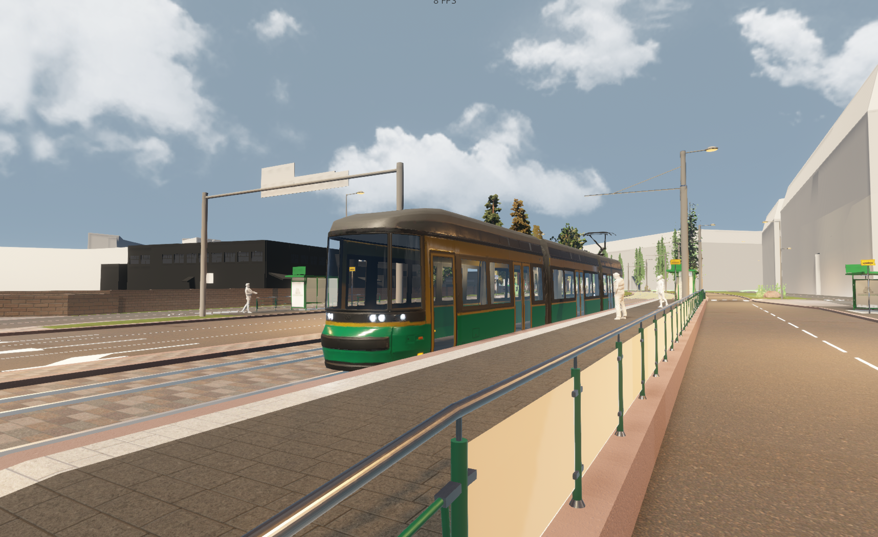 Raitiotiepysäkki Hermannin rantatien ja Vanhan talvitien liittymän vieressä. Pysäkillä on raitiovaunu ja kaksi matkustajaa.